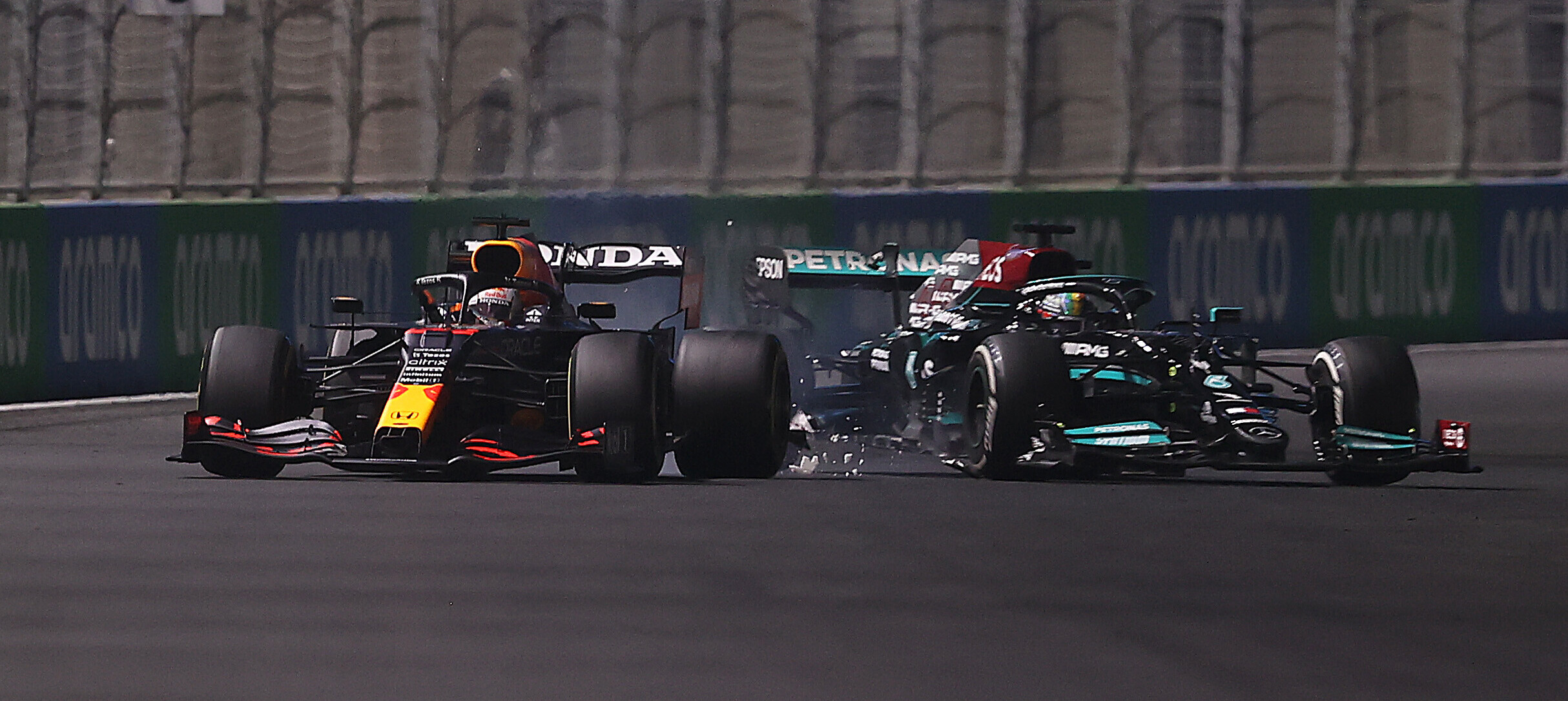 Hamilton Wins after Clashing with Verstappen!