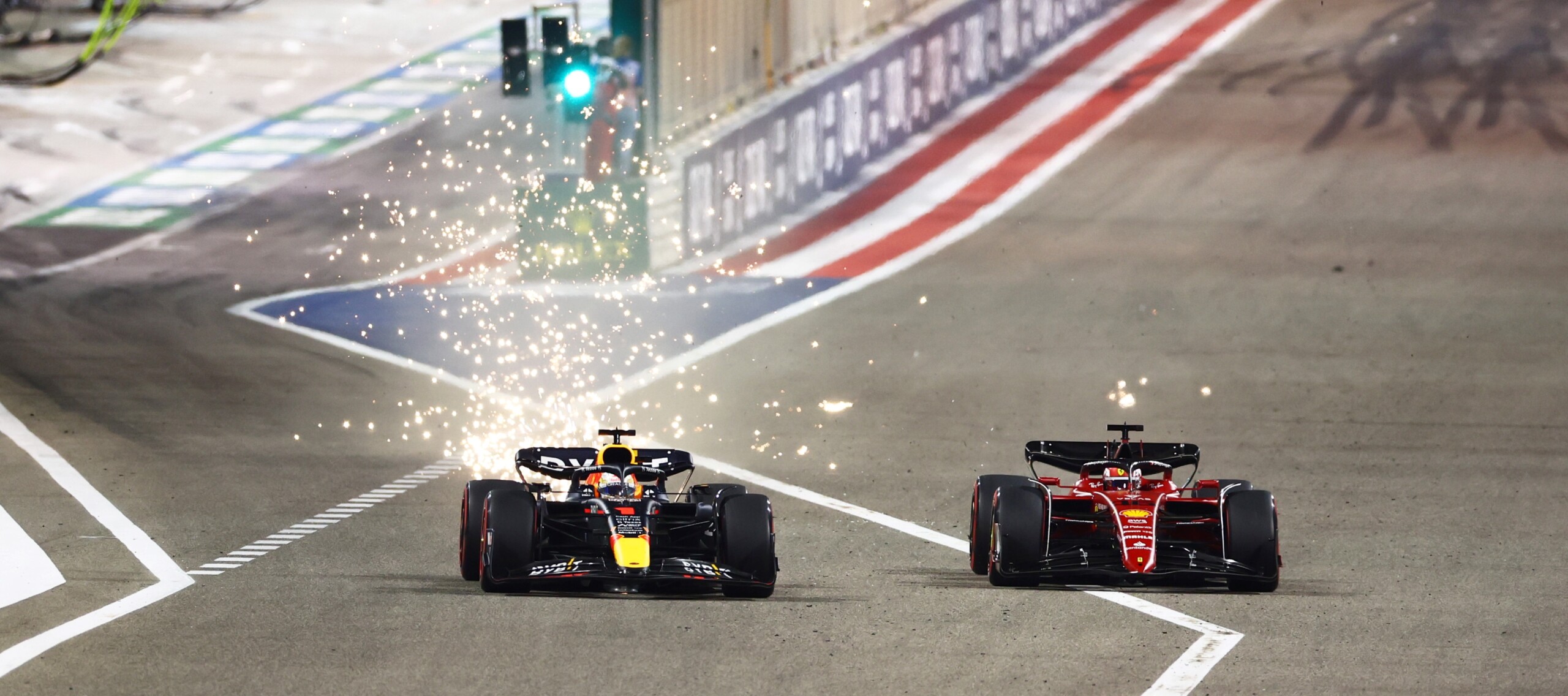 Charles wins the first race with final lap drama