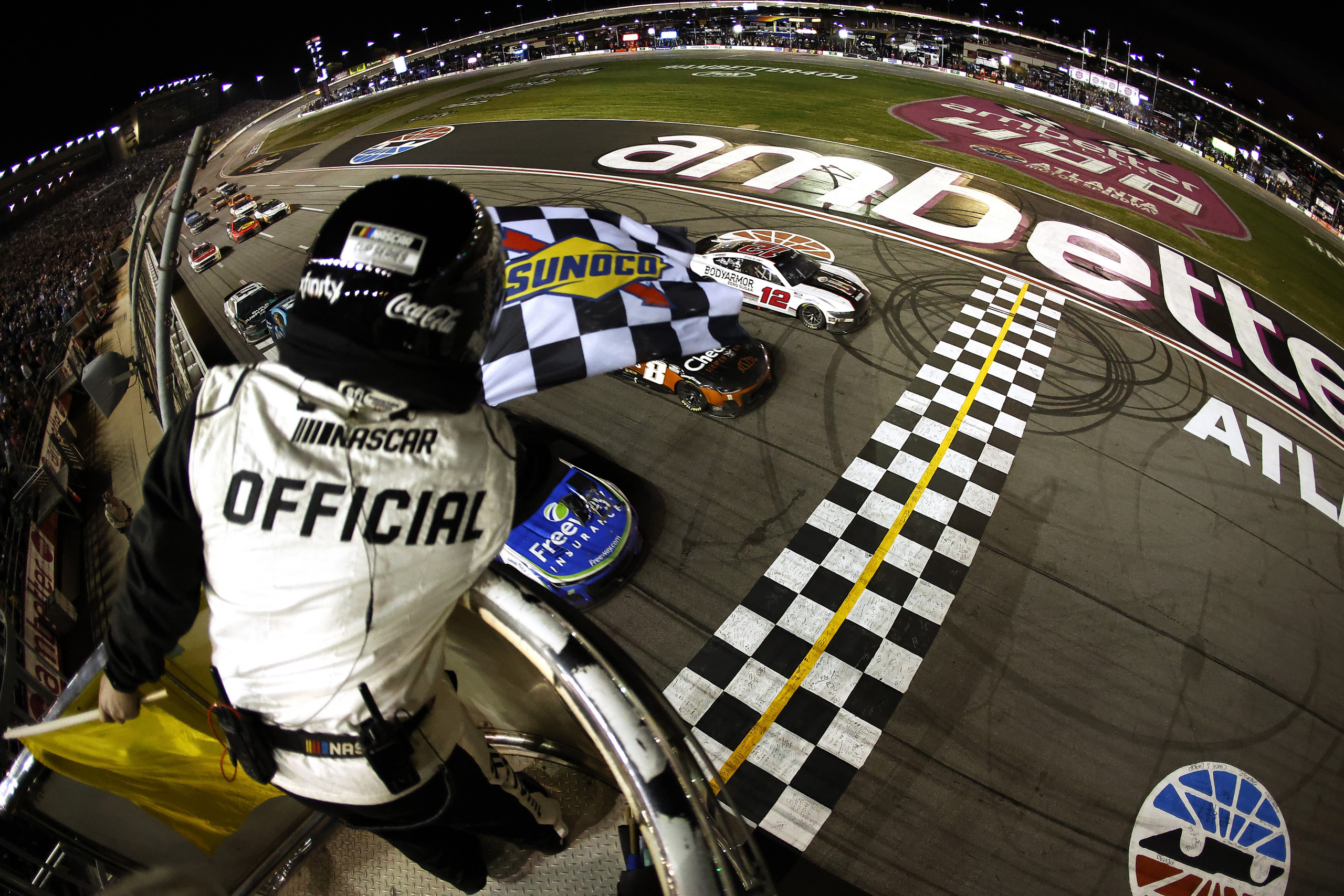 Ka-chow: Daniel Suárez wins Atlanta race in three-wide Pixar-esque photo finish